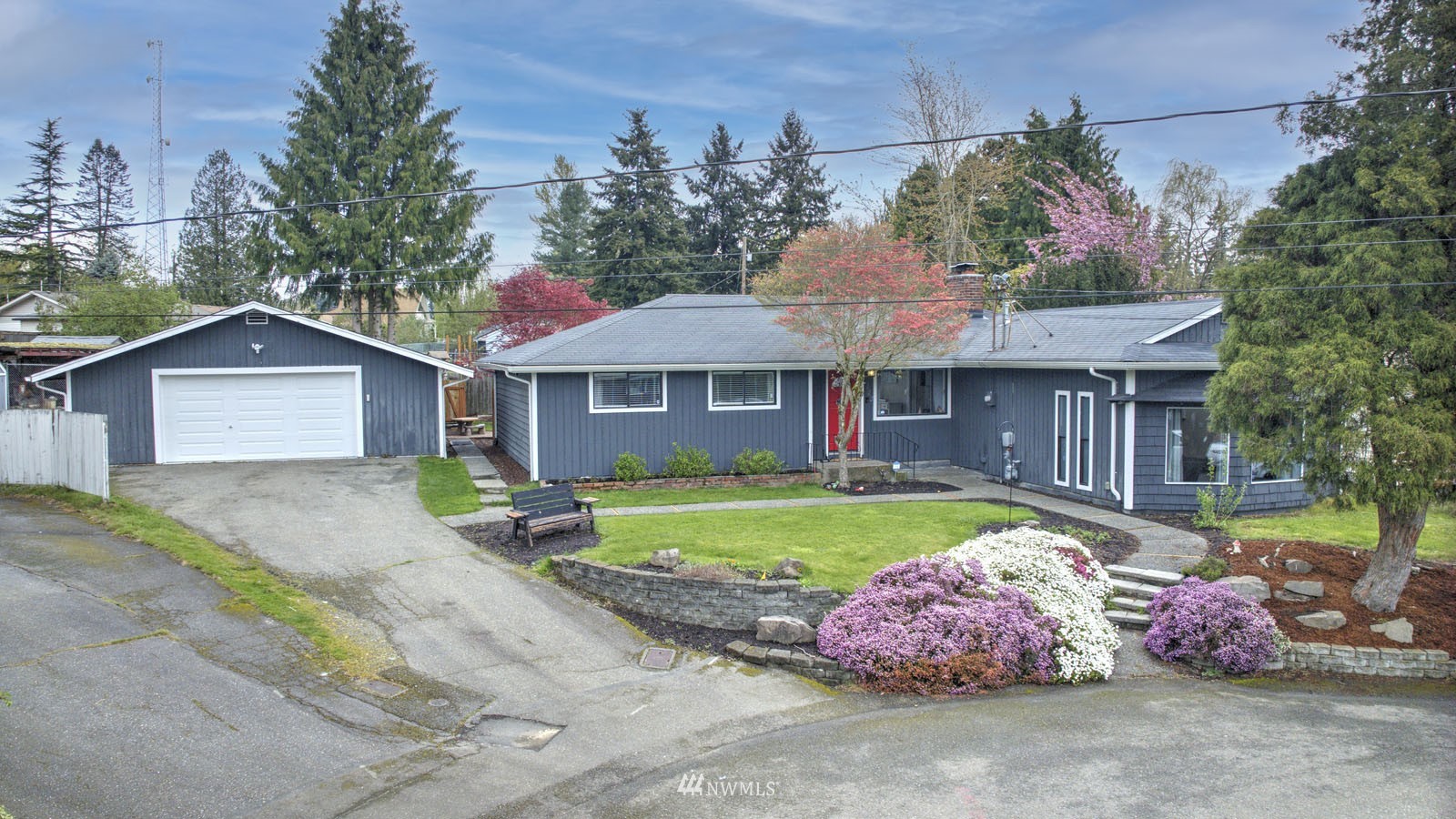 123 234th Street Southwest Bothell, WA 98021 - Photo 1 of 38 a front view of a house with garden