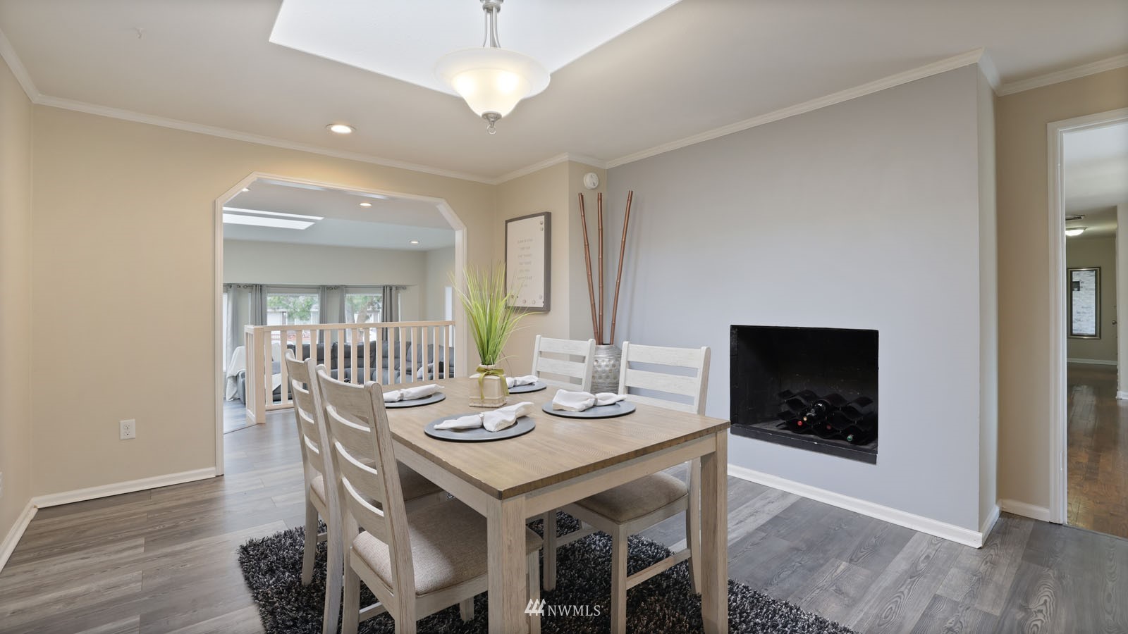 123 234th Street Southwest Bothell, WA 98021 - Photo 12 of 38 a view of a dining room with furniture wooden floor and chandelier