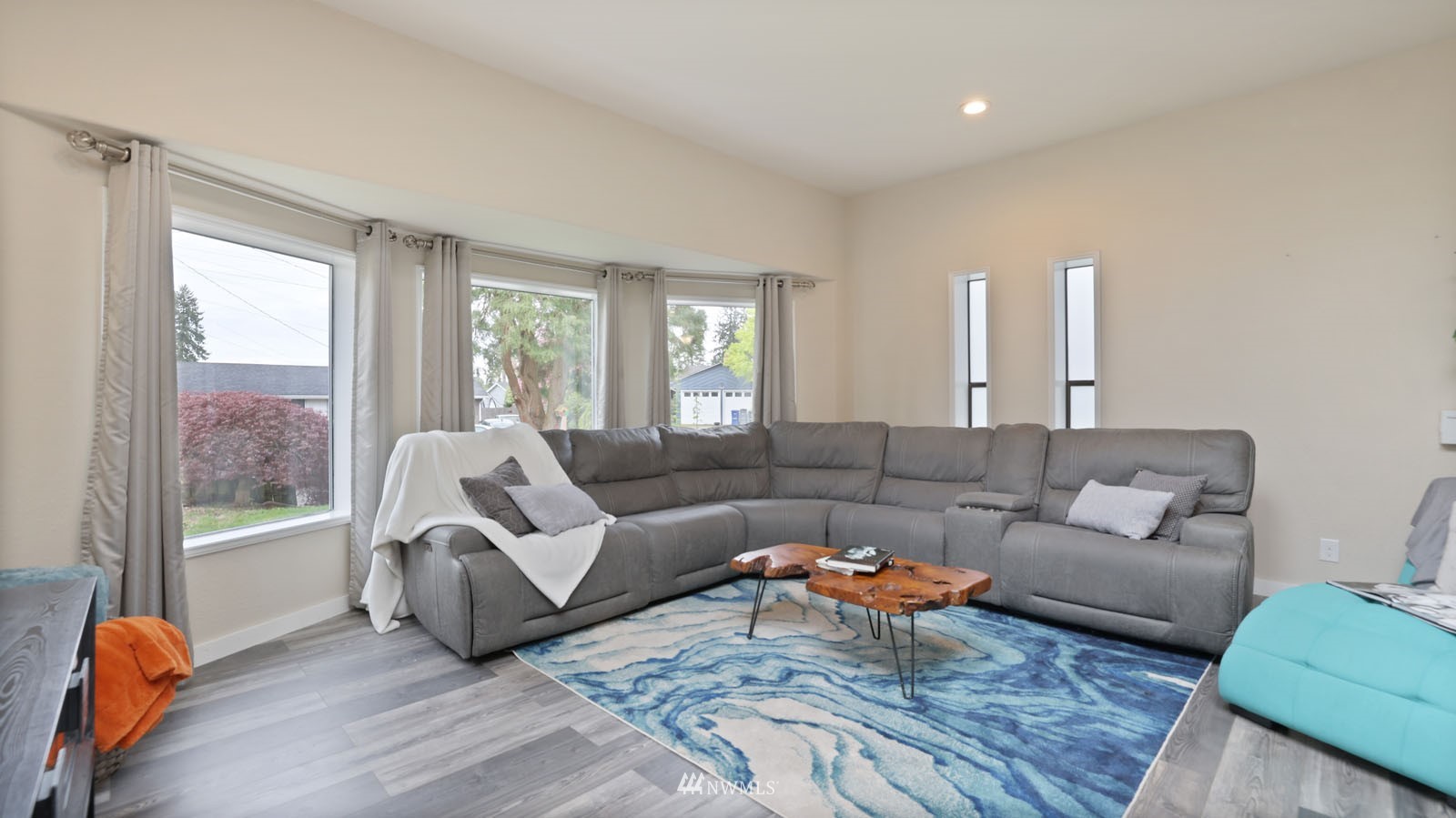 123 234th Street Southwest Bothell, WA 98021 - Photo 15 of 38 a living room with furniture and a large window