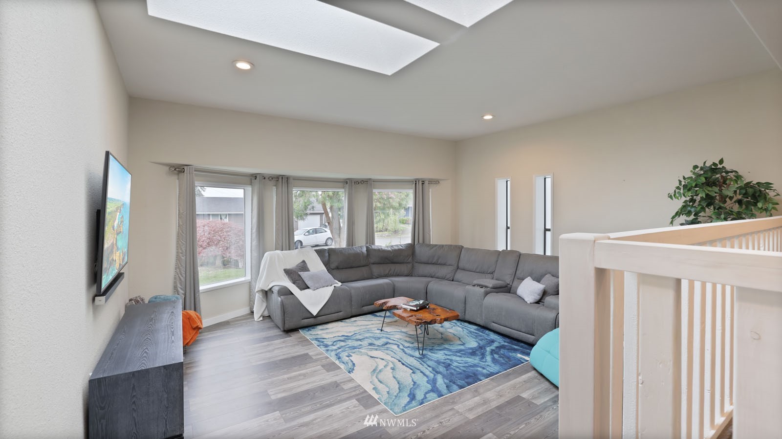 123 234th Street Southwest Bothell, WA 98021 - Photo 17 of 38 a living room with furniture and a couch