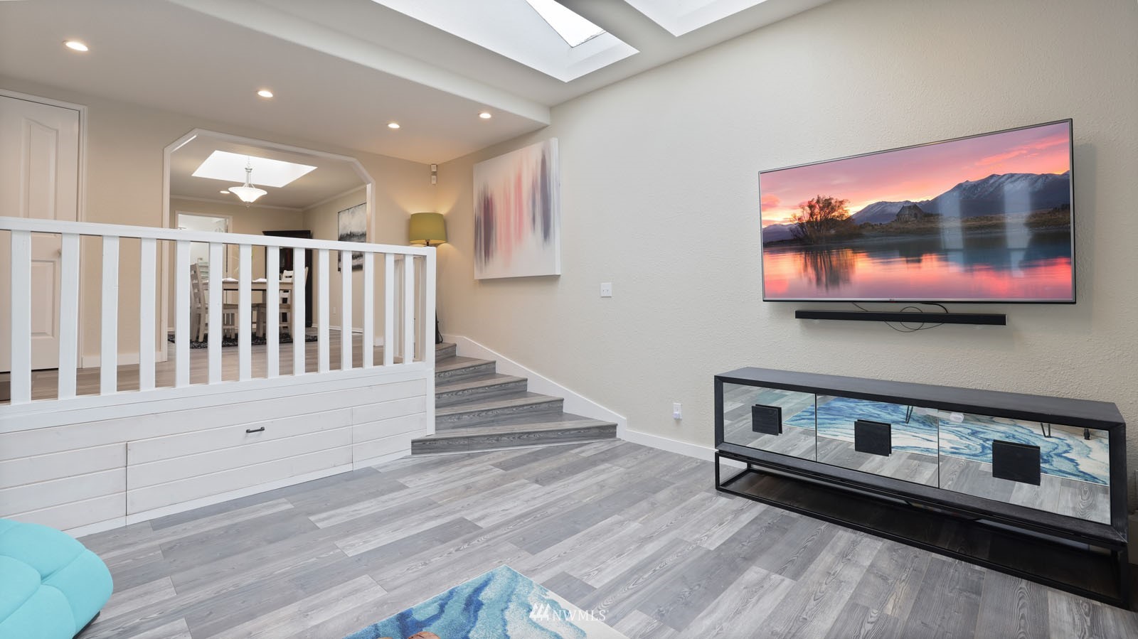 123 234th Street Southwest Bothell, WA 98021 - Photo 18 of 38 a living room with furniture and a flat screen tv