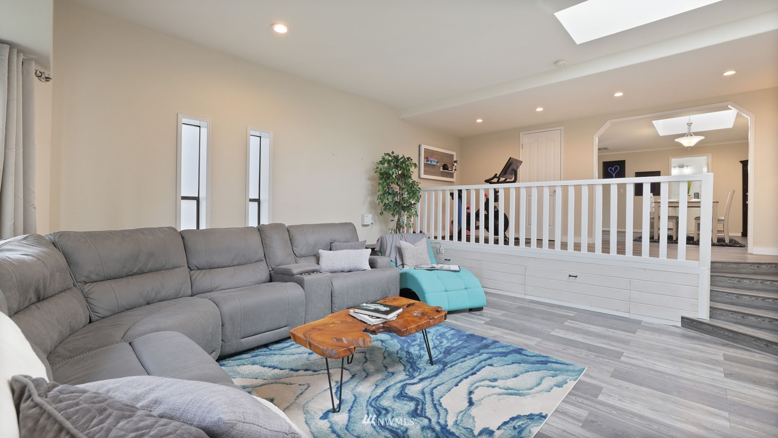 123 234th Street Southwest Bothell, WA 98021 - Photo 19 of 38 a living room with furniture and wooden floor