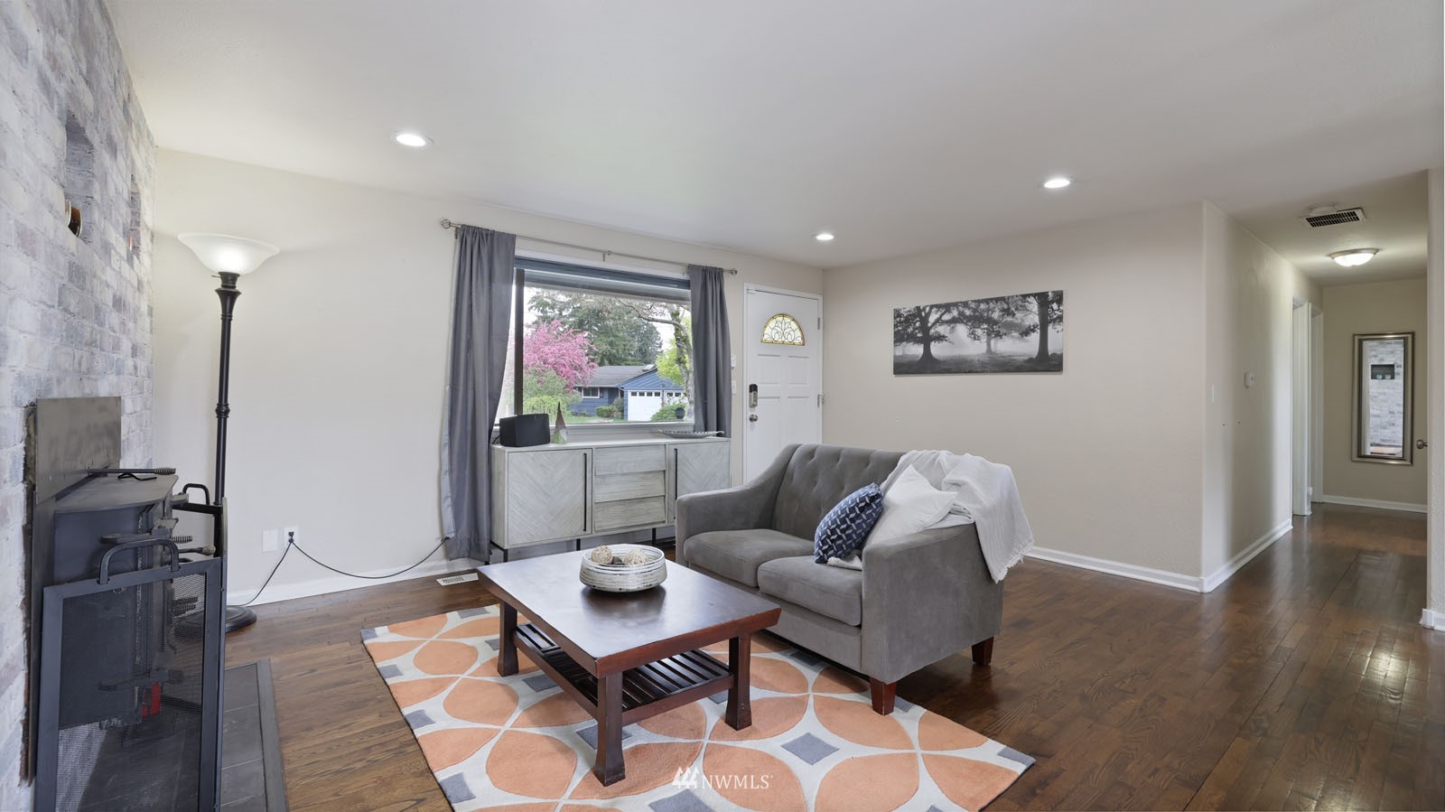 123 234th Street Southwest Bothell, WA 98021 - Photo 2 of 38 a living room with furniture and wooden floor