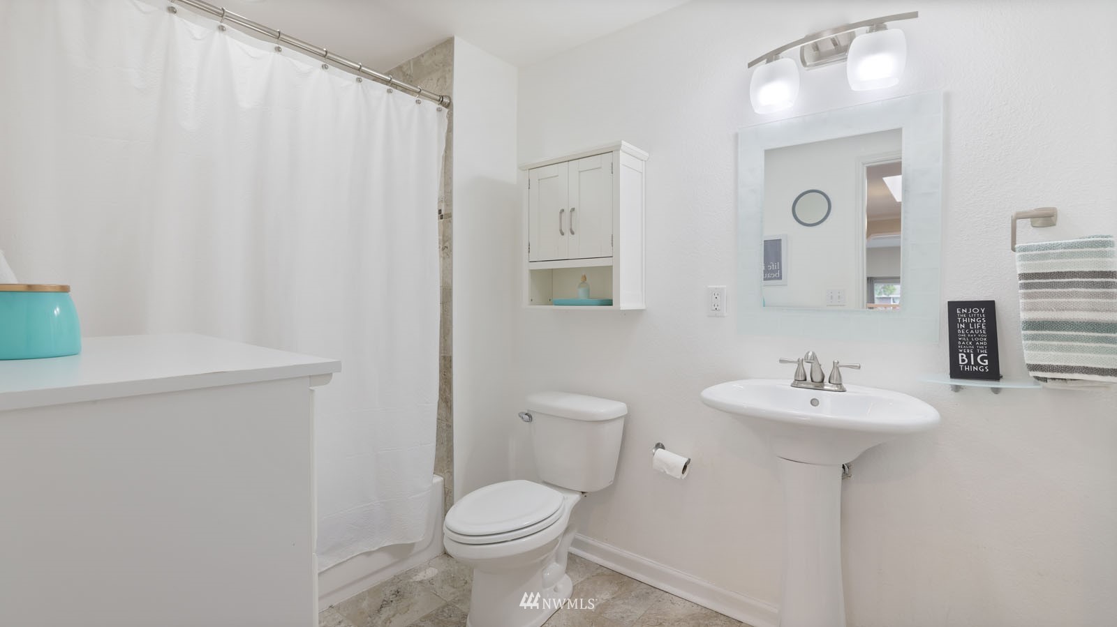 123 234th Street Southwest Bothell, WA 98021 - Photo 22 of 38 a bathroom with a sink toilet and a mirror