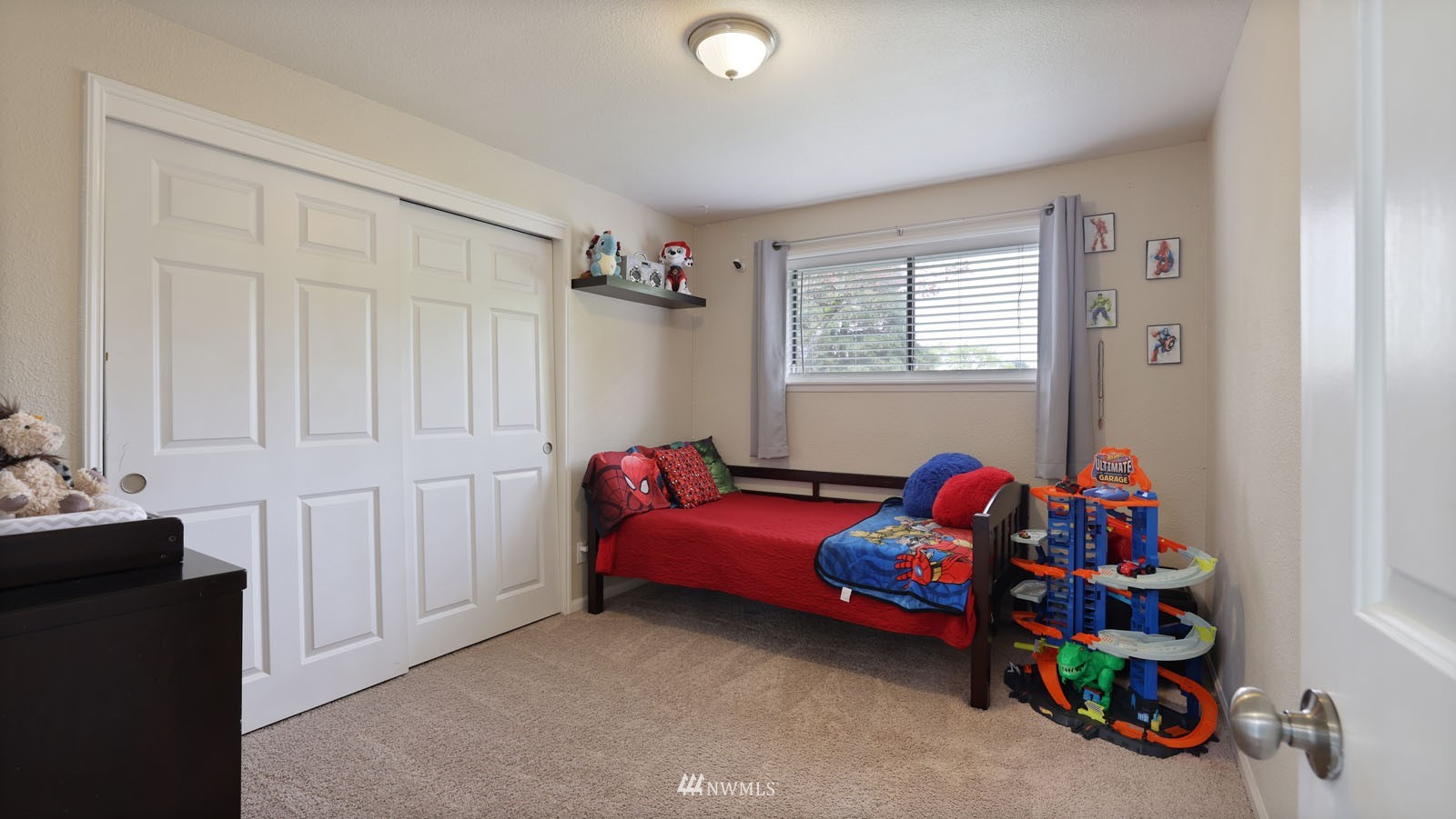 123 234th Street Southwest Bothell, WA 98021 - Photo 26 of 38 a bedroom with bed and window
