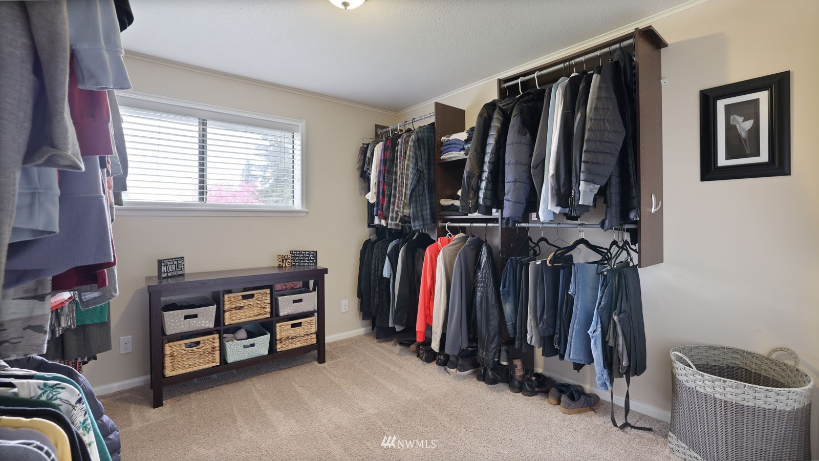 123 234th Street Southwest Bothell, WA 98021 - Photo 27 of 38 a view of walk in closet with clothes and shoes