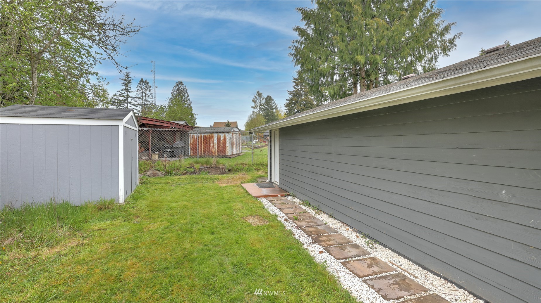 123 234th Street Southwest Bothell, WA 98021 - Photo 32 of 38 a backyard of a house with lots of green space