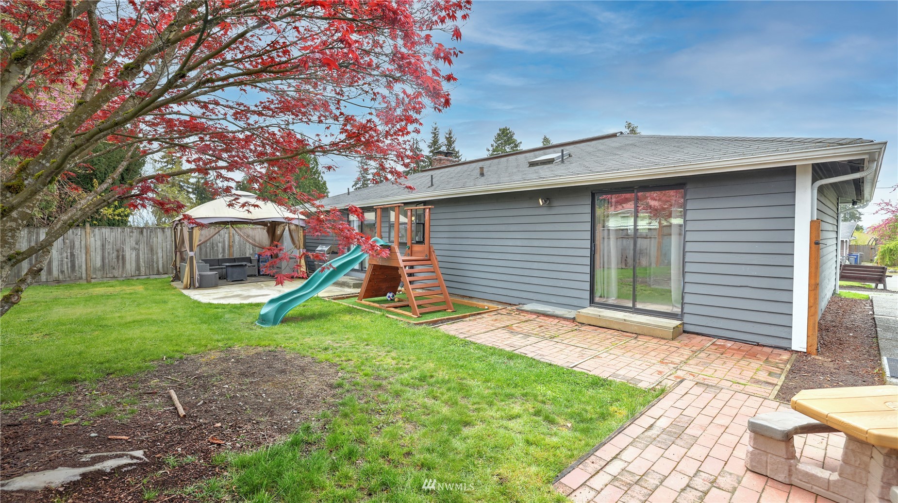 123 234th Street Southwest Bothell, WA 98021 - Photo 34 of 38 a view of a backyard with a slide