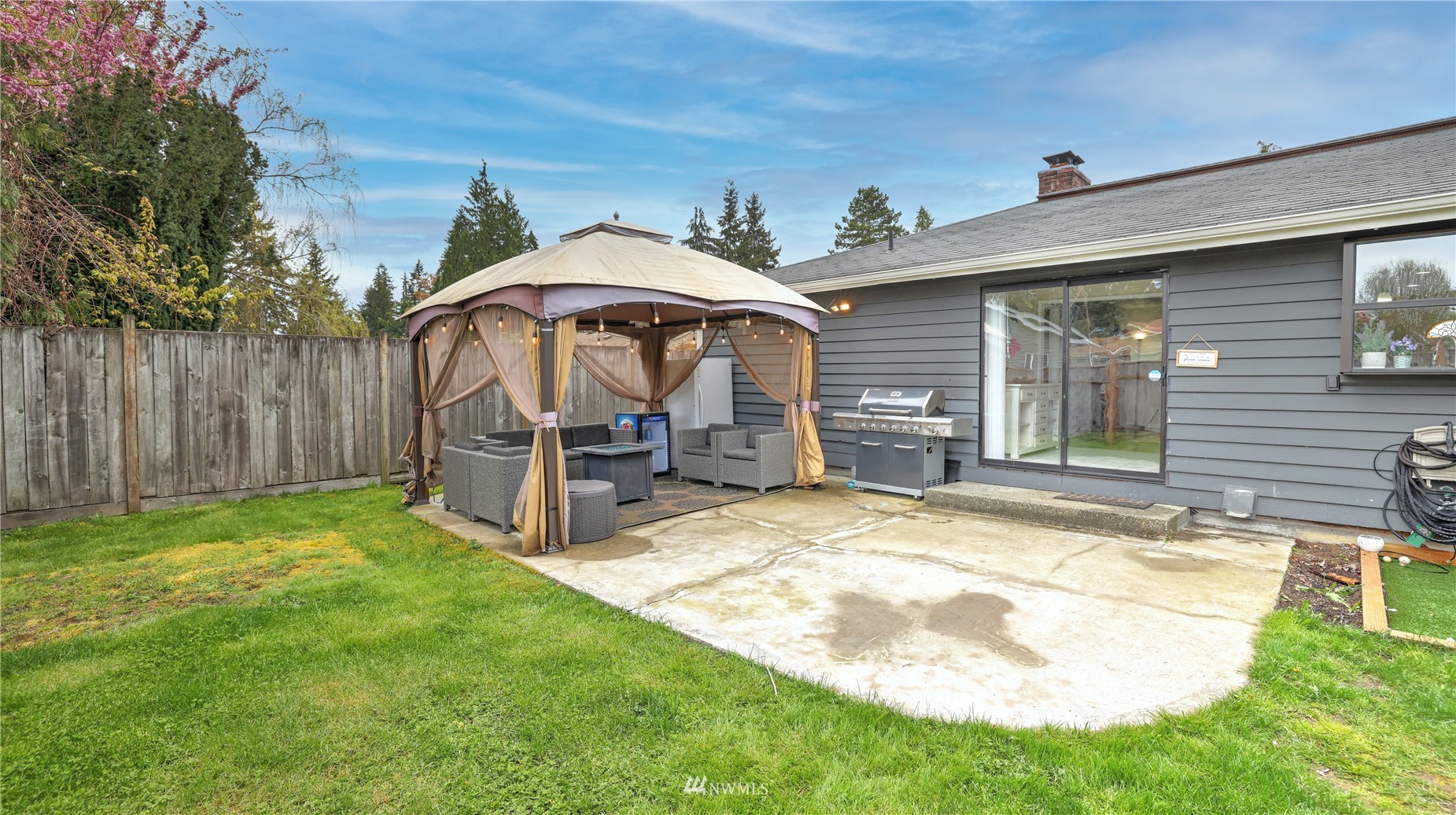 123 234th Street Southwest Bothell, WA 98021 - Photo 35 of 38 a view of a house with a yard and sitting area