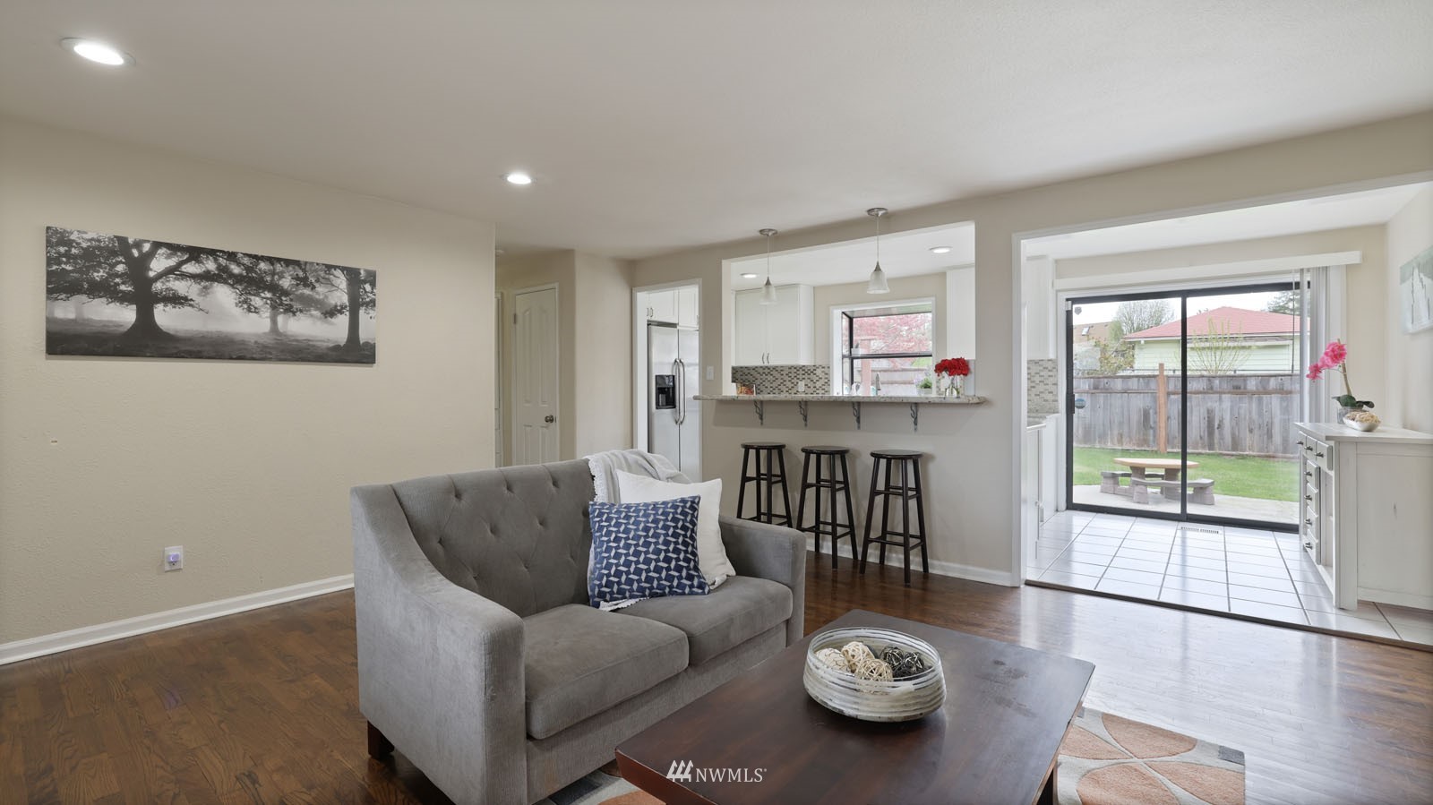 123 234th Street Southwest Bothell, WA 98021 - Photo 4 of 38 a living room with furniture and a table