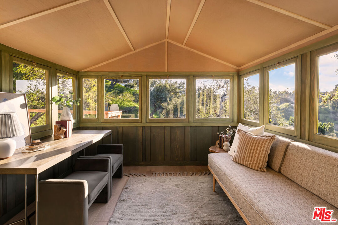 2006 El Moran Street Los Angeles, CA 90039 - Photo 19 of 35 a living room with furniture and a flat screen tv