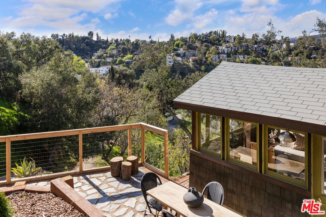 2006 El Moran Street Los Angeles, CA 90039 - Photo 22 of 35 a view of a terrace with wooden floor and iron fence