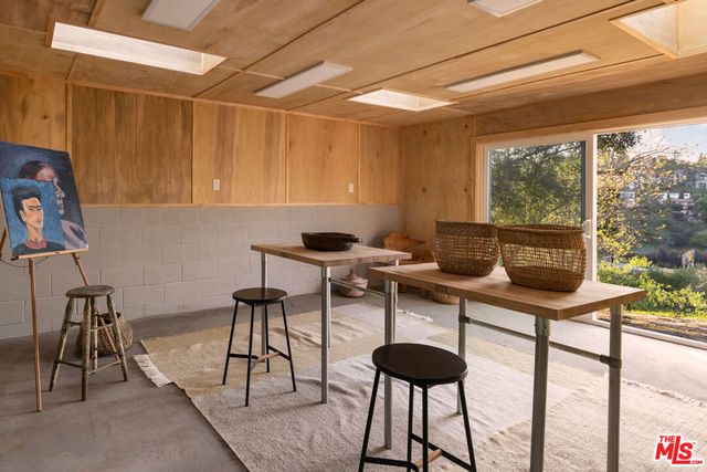 a room with furniture and a window