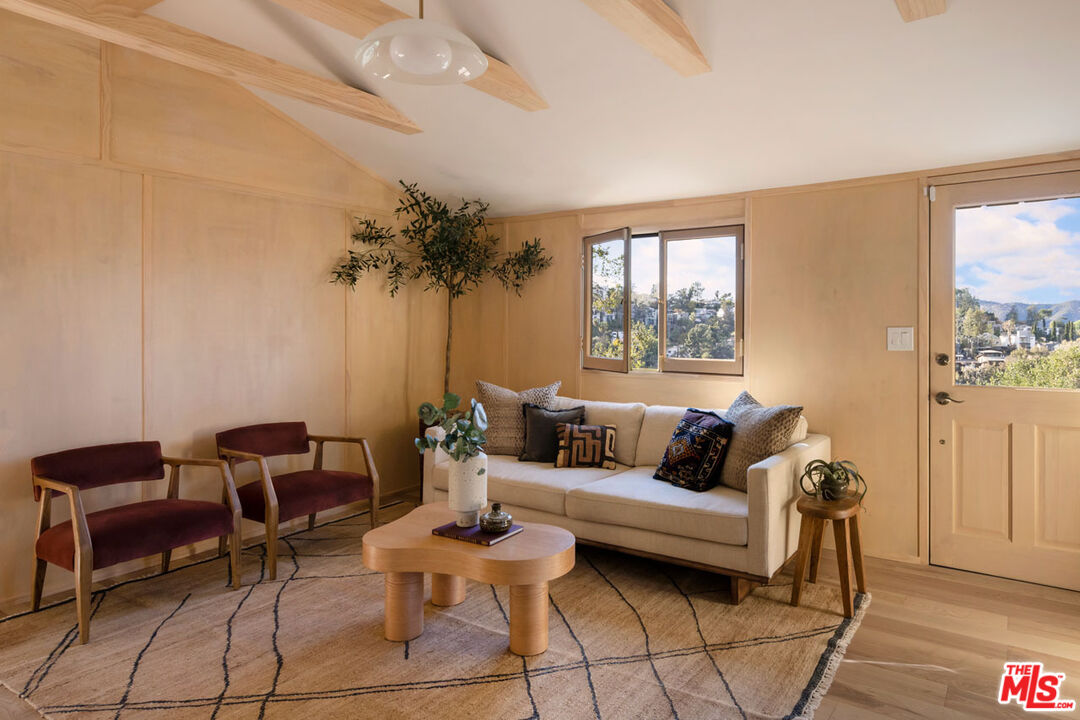 2006 El Moran Street Los Angeles, CA 90039 - Photo 5 of 35 a living room with furniture and a large window
