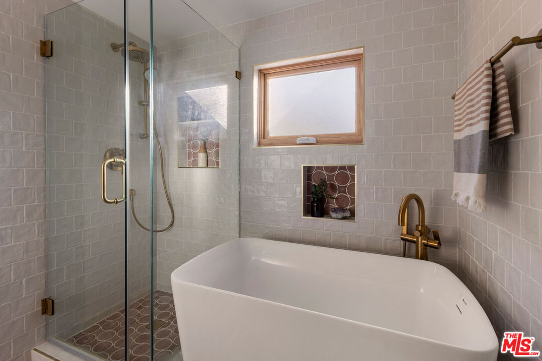 2006 El Moran Street Los Angeles, CA 90039 - Photo 10 of 35 a bathroom with a bath tub and shower