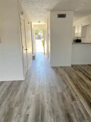 a fireplace with wooden floor