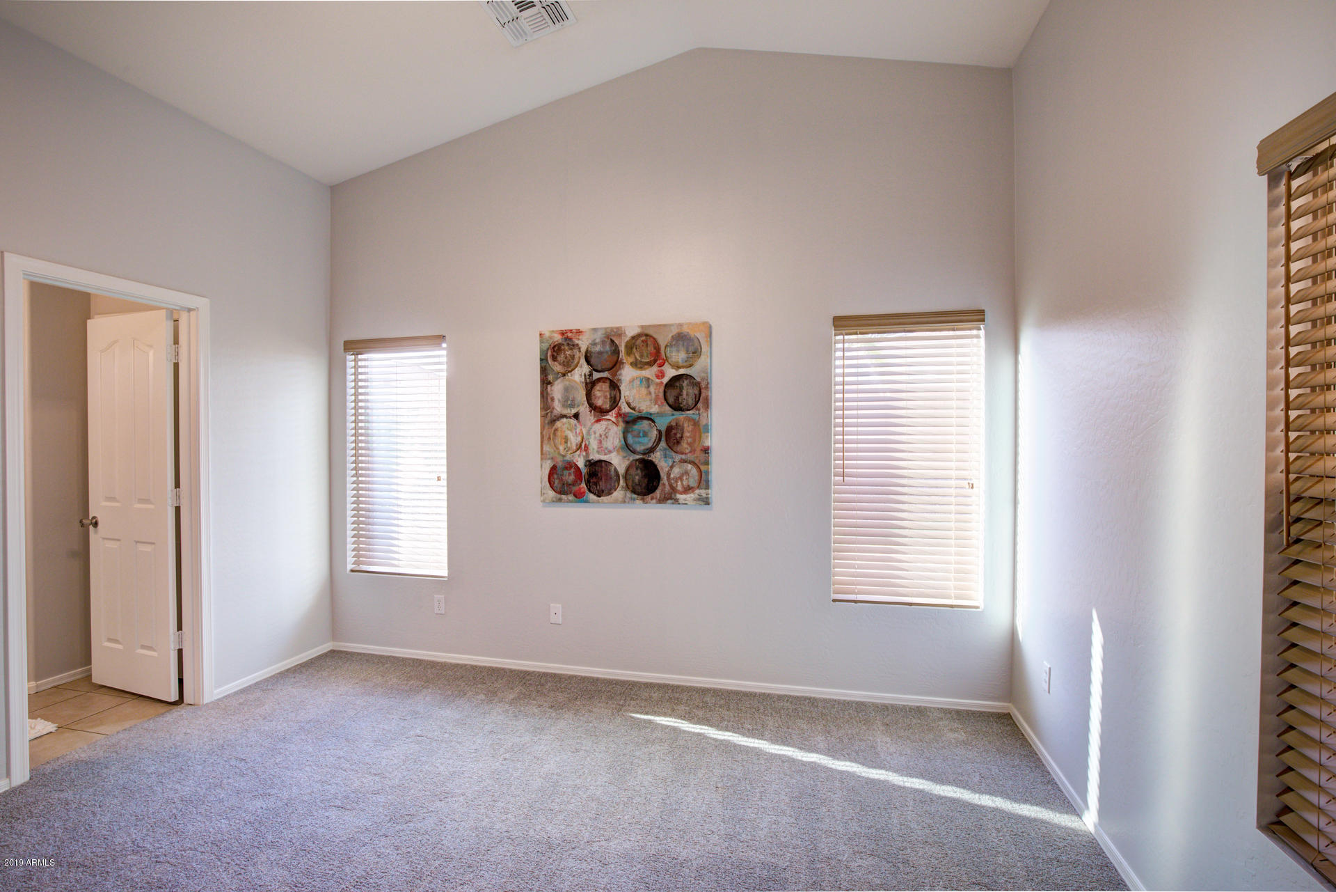 17858 West Calavar Road Surprise, AZ 85388 - Photo 14 of 28 Master bedroom