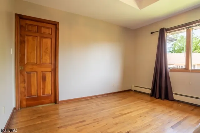 an empty room with window