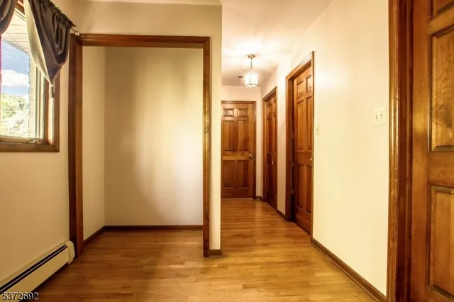 a view of a bathroom with a glass door