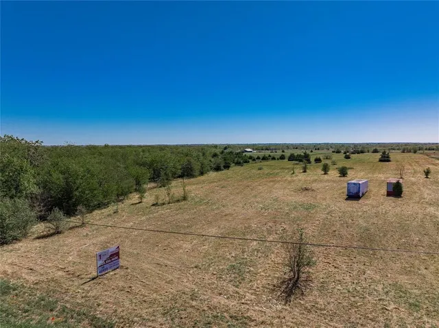 a view of a swimming pool with an ocean view
