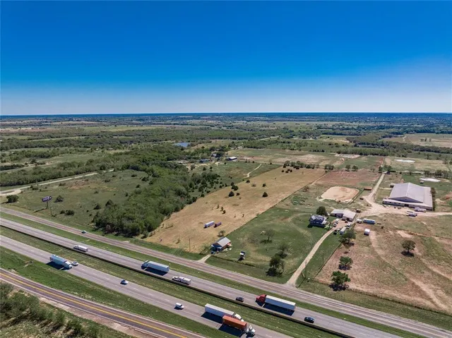 an aerial view of beach and ocean