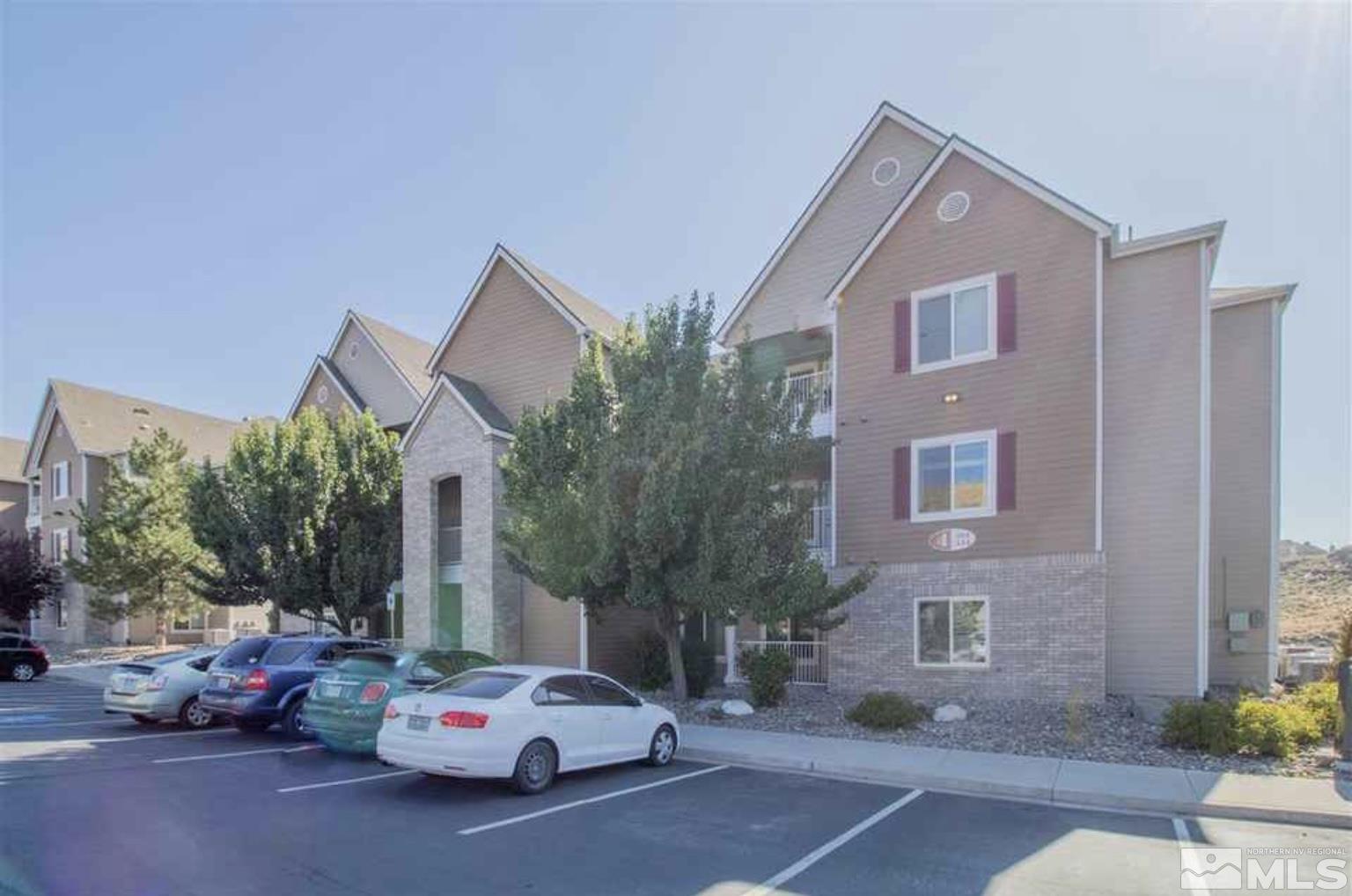 200 Talus Way, Unit 414 Reno, NV 89503 - Photo 1 of 22 a car parked in front of a house