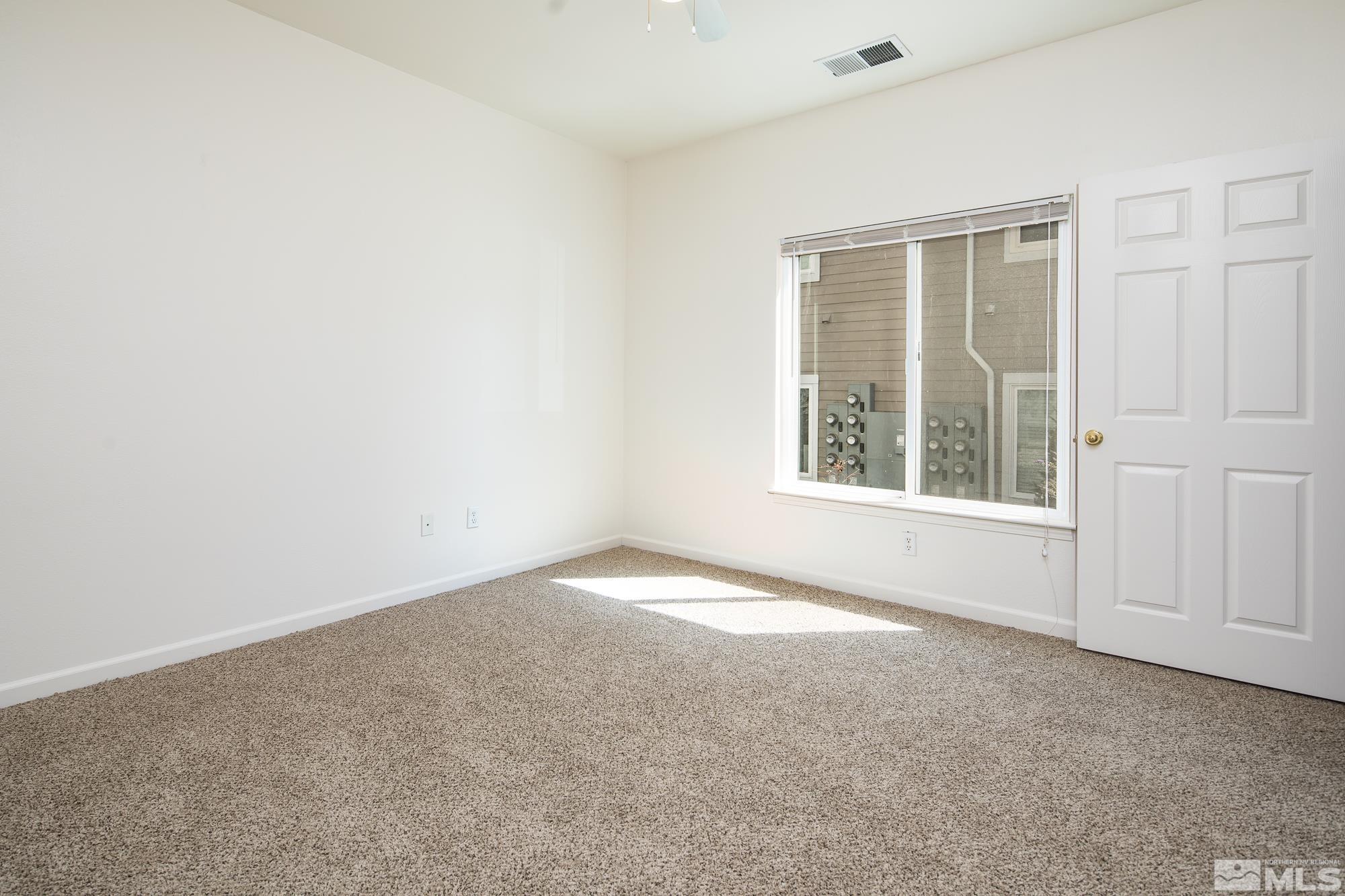 200 Talus Way, Unit 414 Reno, NV 89503 - Photo 15 of 22 an empty room with a window