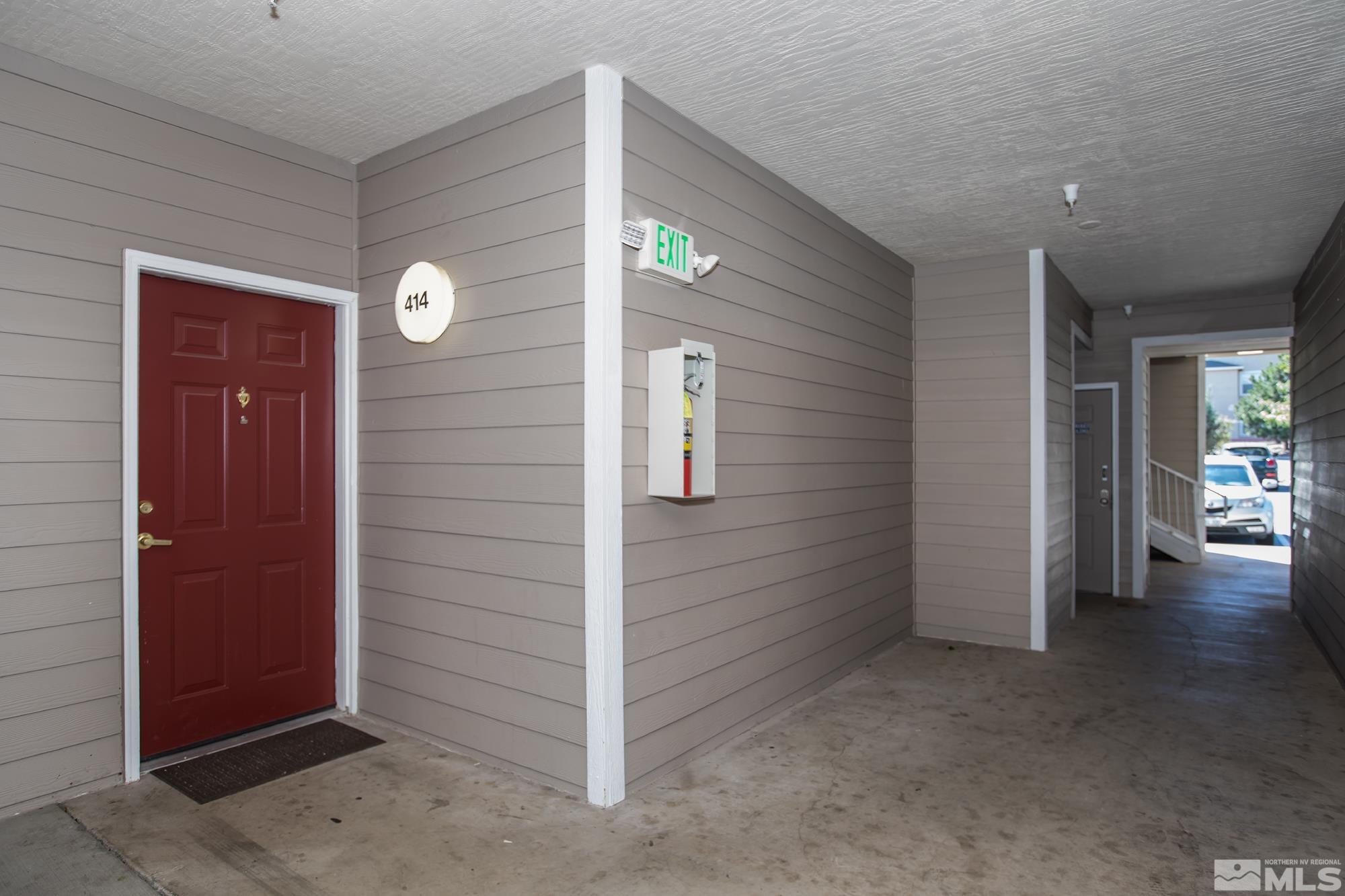 200 Talus Way, Unit 414 Reno, NV 89503 - Photo 2 of 22 an empty room with windows
