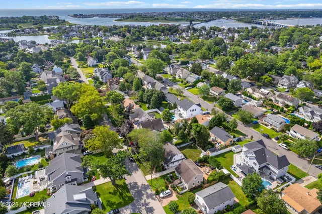 an aerial view of a city with lots of residential buildings