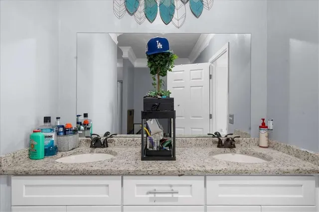 a sink with a granite counter top