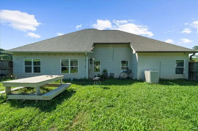 a house view with a garden space