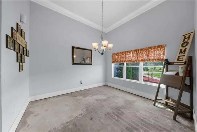 a view of a livingroom with furniture window and outside view