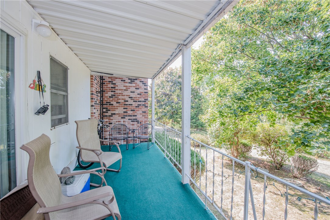 347 Main Road, Unit 203 Tiverton, RI 02878 - Photo 16 of 16 Private covered Balcony/Porch