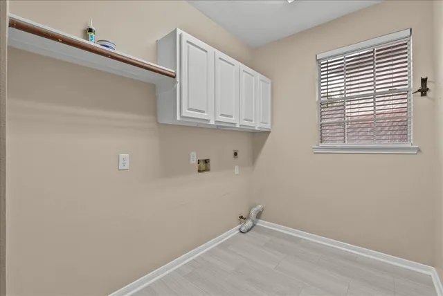 a view of yard with swimming pool and green space