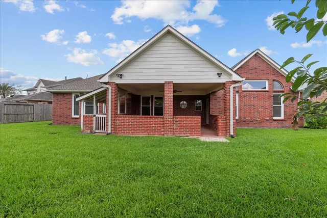 an aerial view of a house with a garden