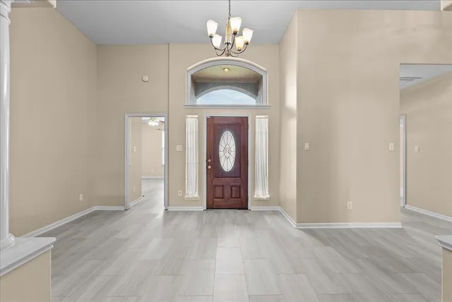 a view of livingroom with hardwood floor and ceiling fan