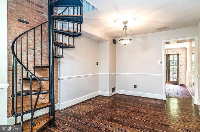 23 East Wheeling Street Baltimore, MD 21230 - Photo 16 of 16 Stairwell updated to basement wash/dry area