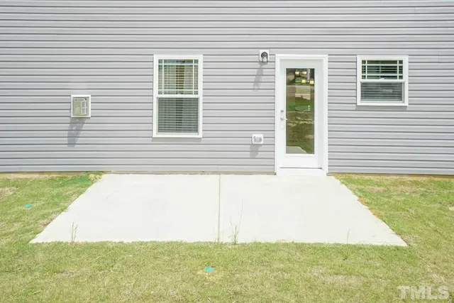 a view of backyard of house