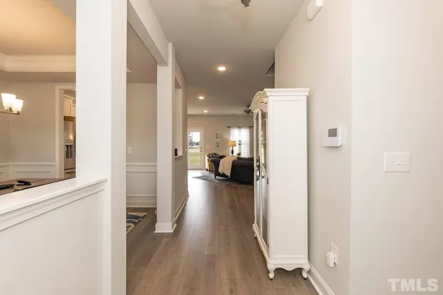 a view of a living room with a refrigerator
