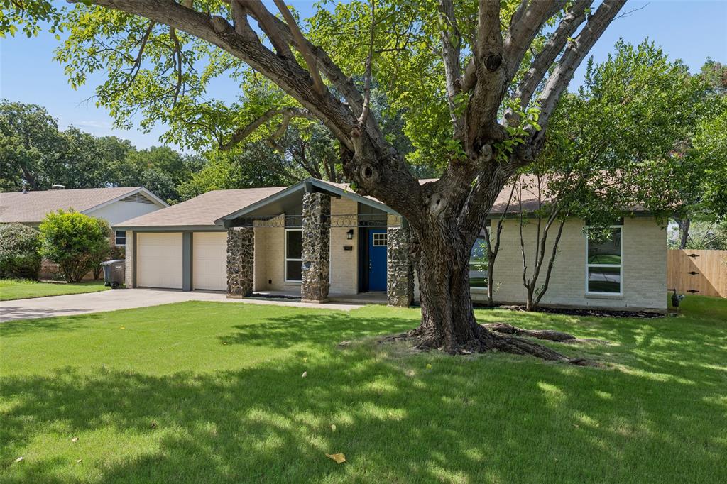 4725 St Lawrence Road Fort Worth, TX 76103 - Photo 2 of 26 Single-story residence featuring a brick exterior and a gabled roofline