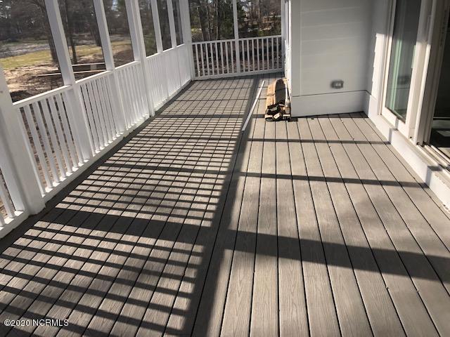 3937 Bay Colony Road Northeast Leland, NC 28451 - Photo 11 of 13 Screened in back porch