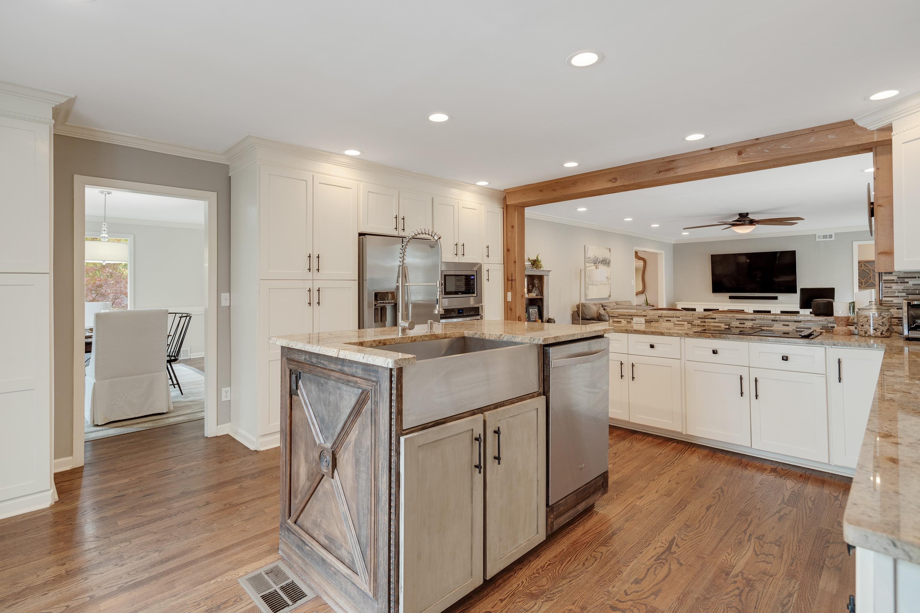 5585 Walnut Grove Road Memphis, TN 38120 - Photo 12 of 25 a kitchen with white cabinets and sink