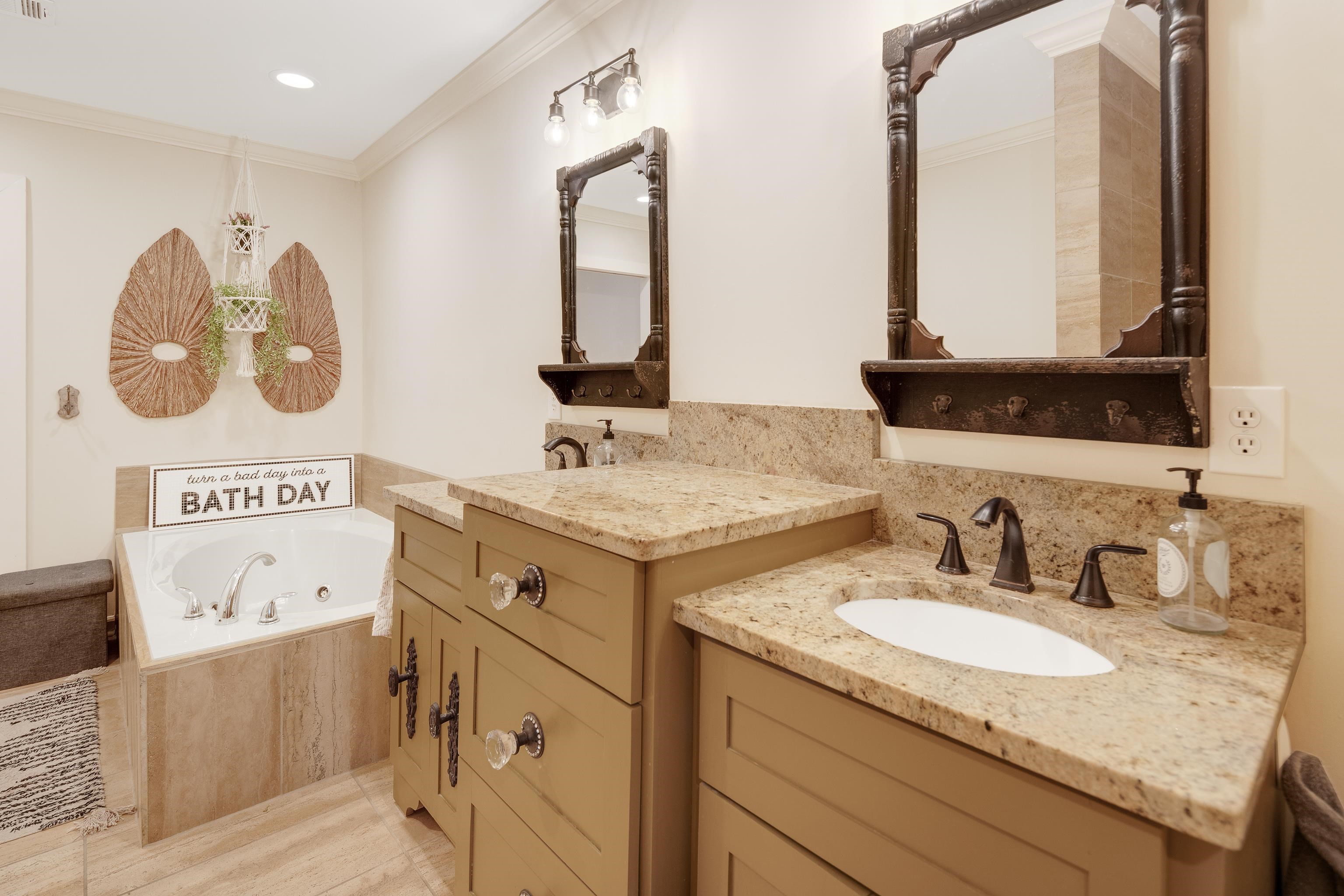 5585 Walnut Grove Road Memphis, TN 38120 - Photo 16 of 25 a bathroom with a sink and a mirror