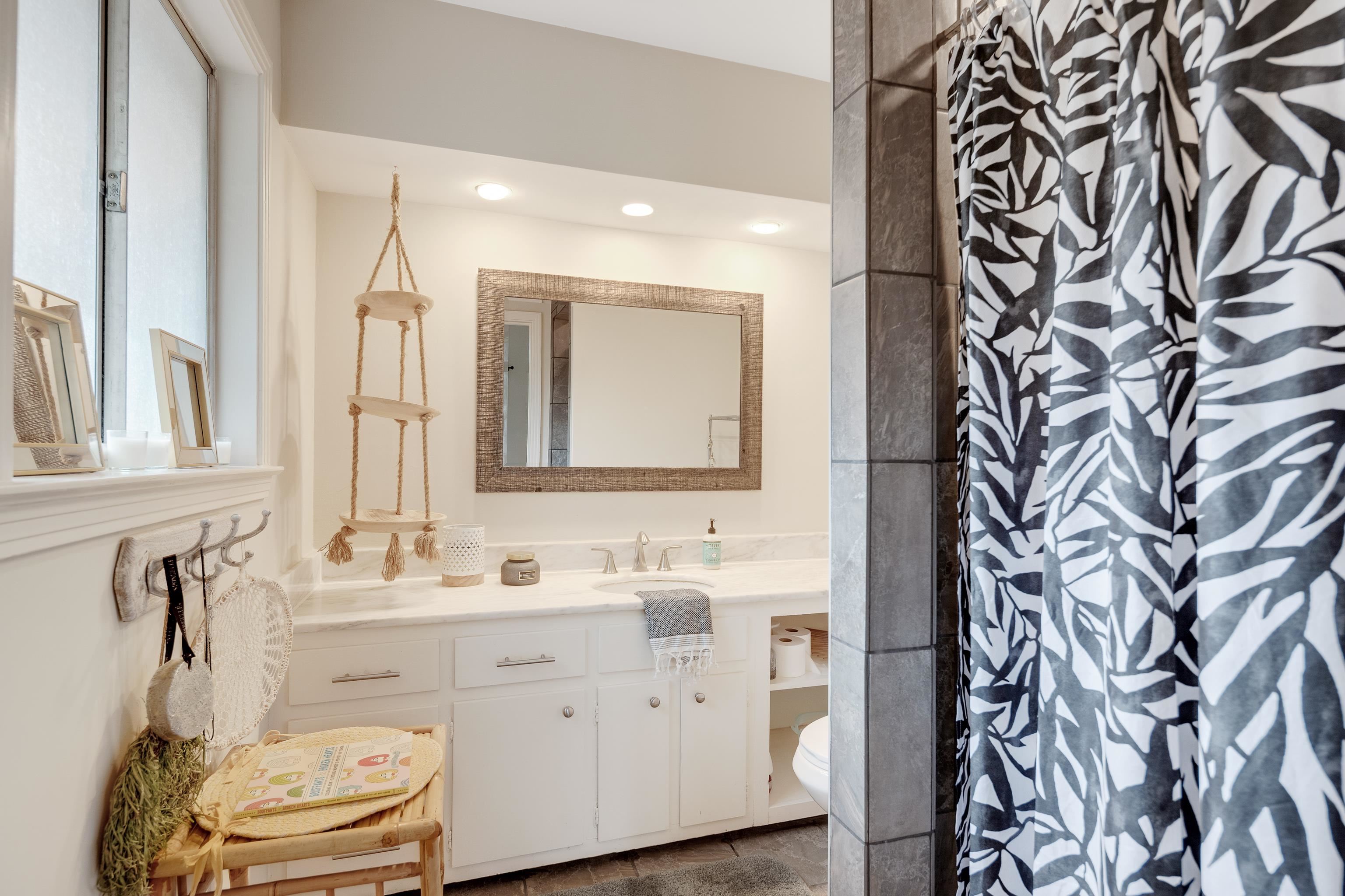 5585 Walnut Grove Road Memphis, TN 38120 - Photo 19 of 25 a bathroom with a sink and a mirror