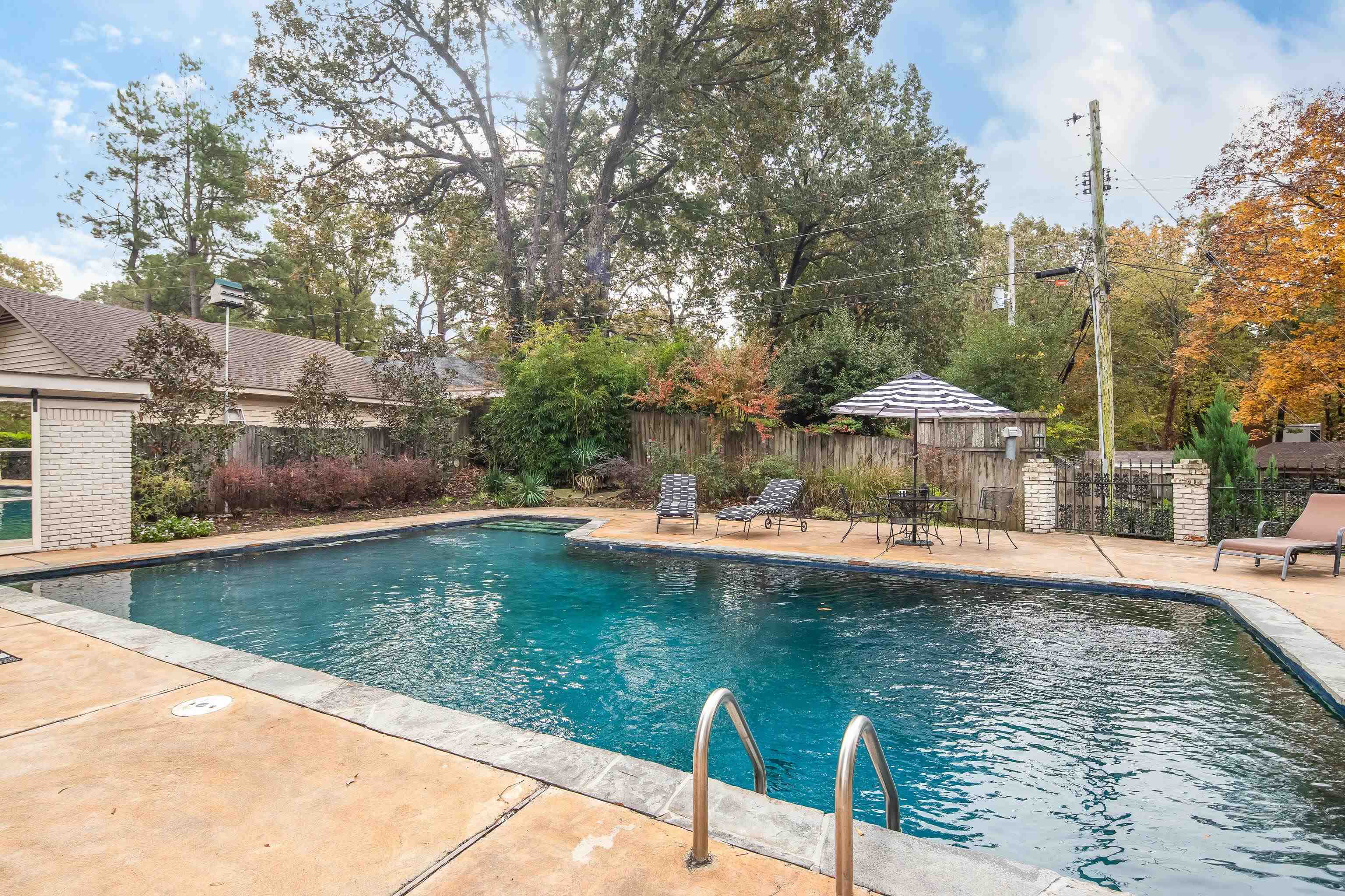 5585 Walnut Grove Road Memphis, TN 38120 - Photo 24 of 25 a view of a swimming pool with a patio
