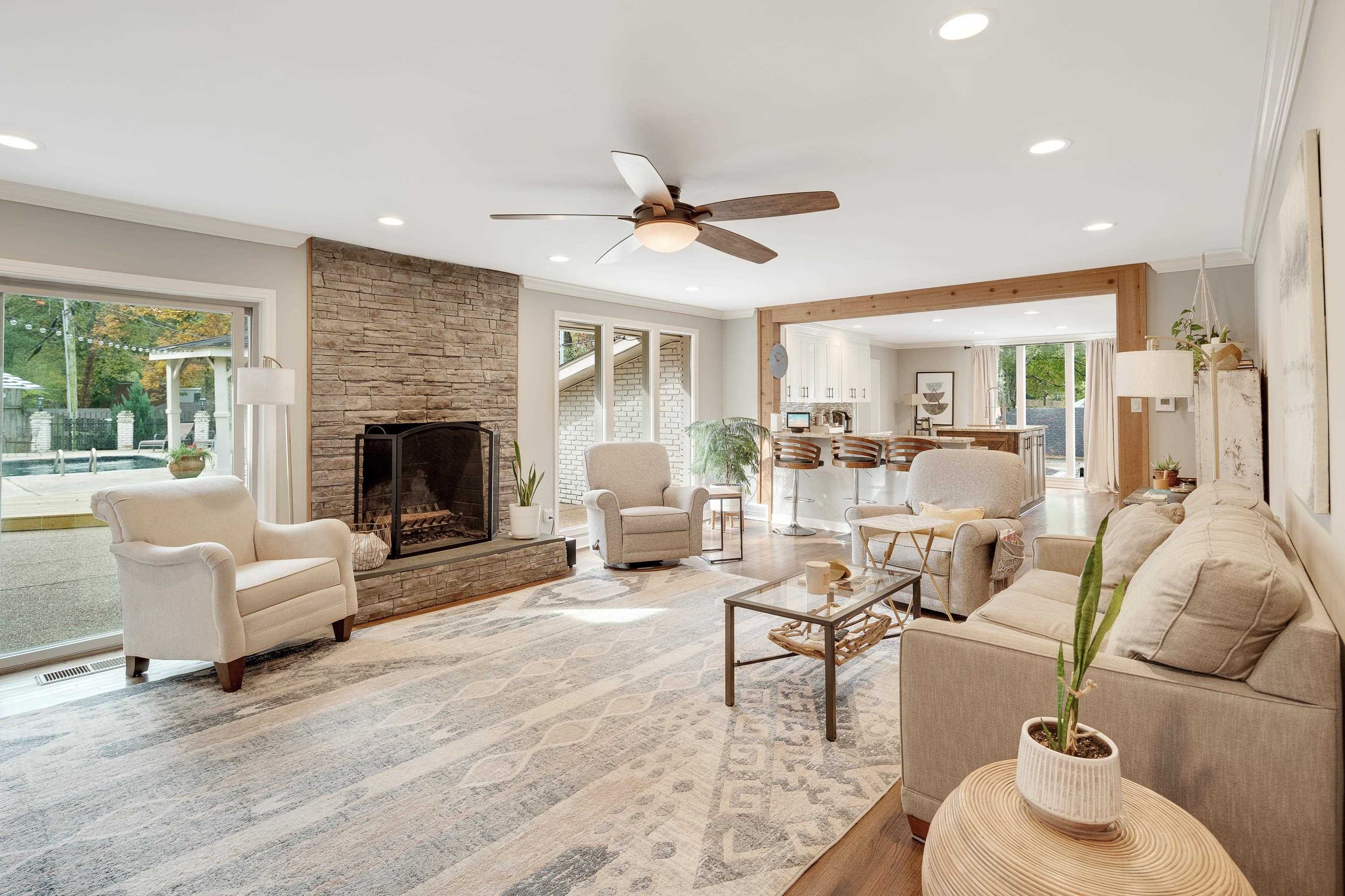 5585 Walnut Grove Road Memphis, TN 38120 - Photo 7 of 25 a living room with furniture and a fireplace