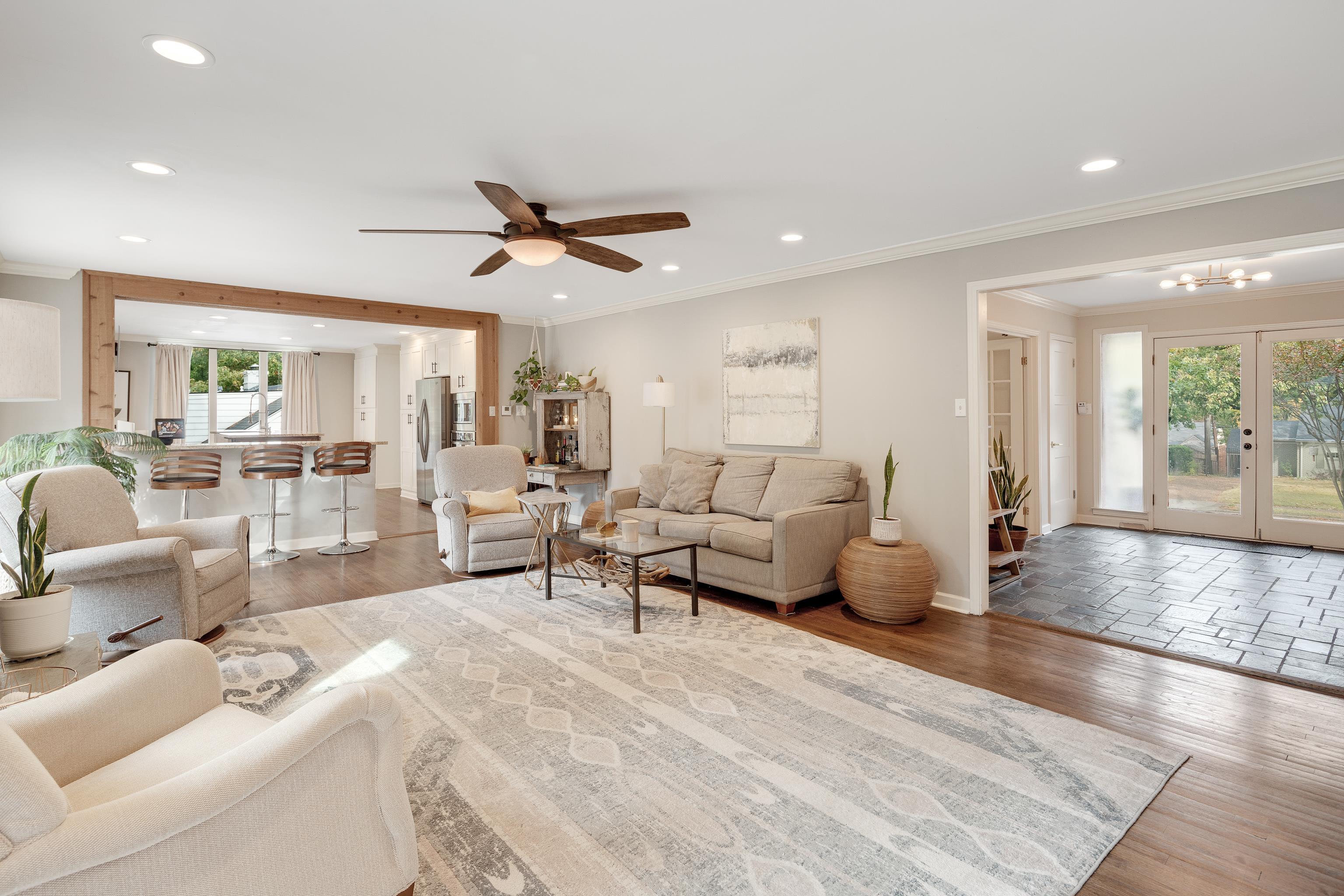 5585 Walnut Grove Road Memphis, TN 38120 - Photo 8 of 25 a living room with furniture and a large window