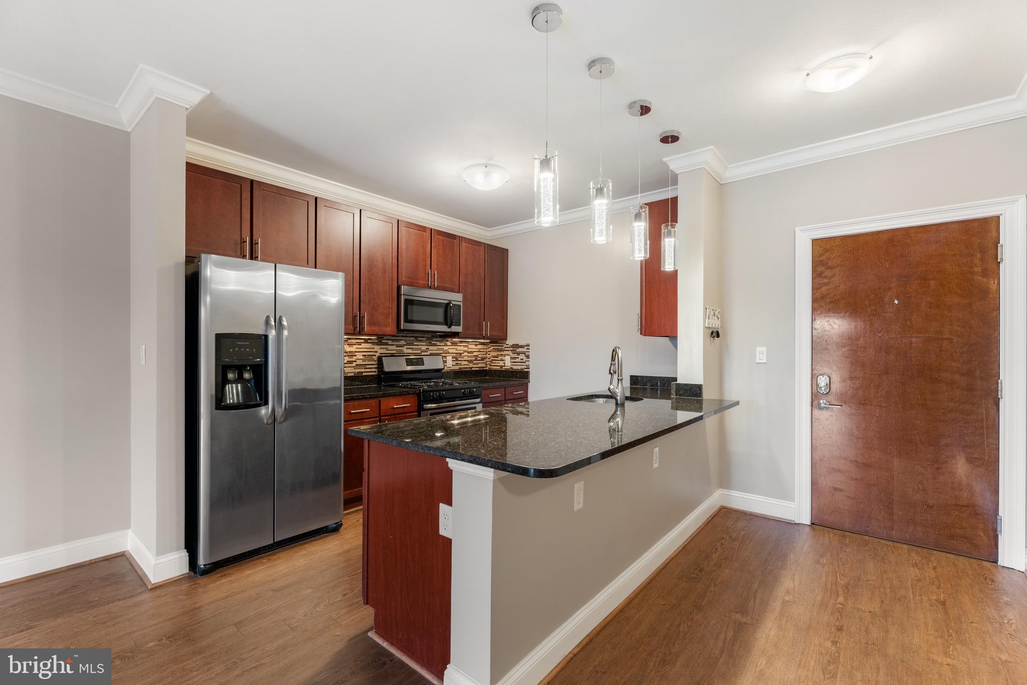 6301 Edsall Road, Unit 400 Alexandria, VA 22312 - Photo 7 of 28 Spacious Kitchen w/ Bar Ledge