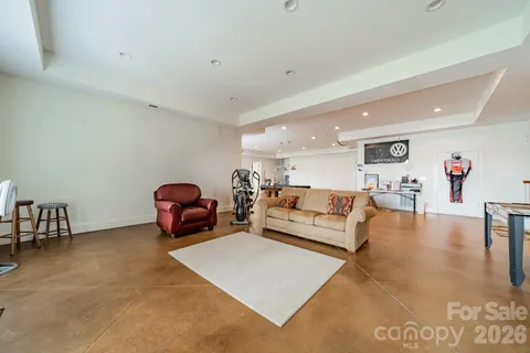a living room with furniture and a table