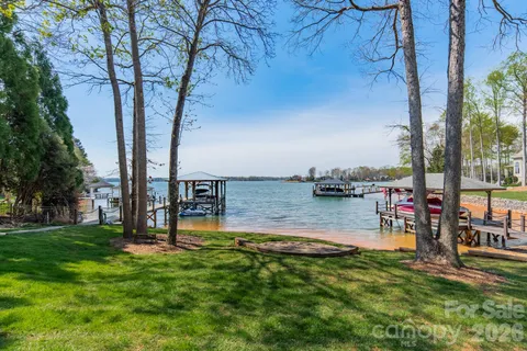 a view of a swimming pool with a table and chairs